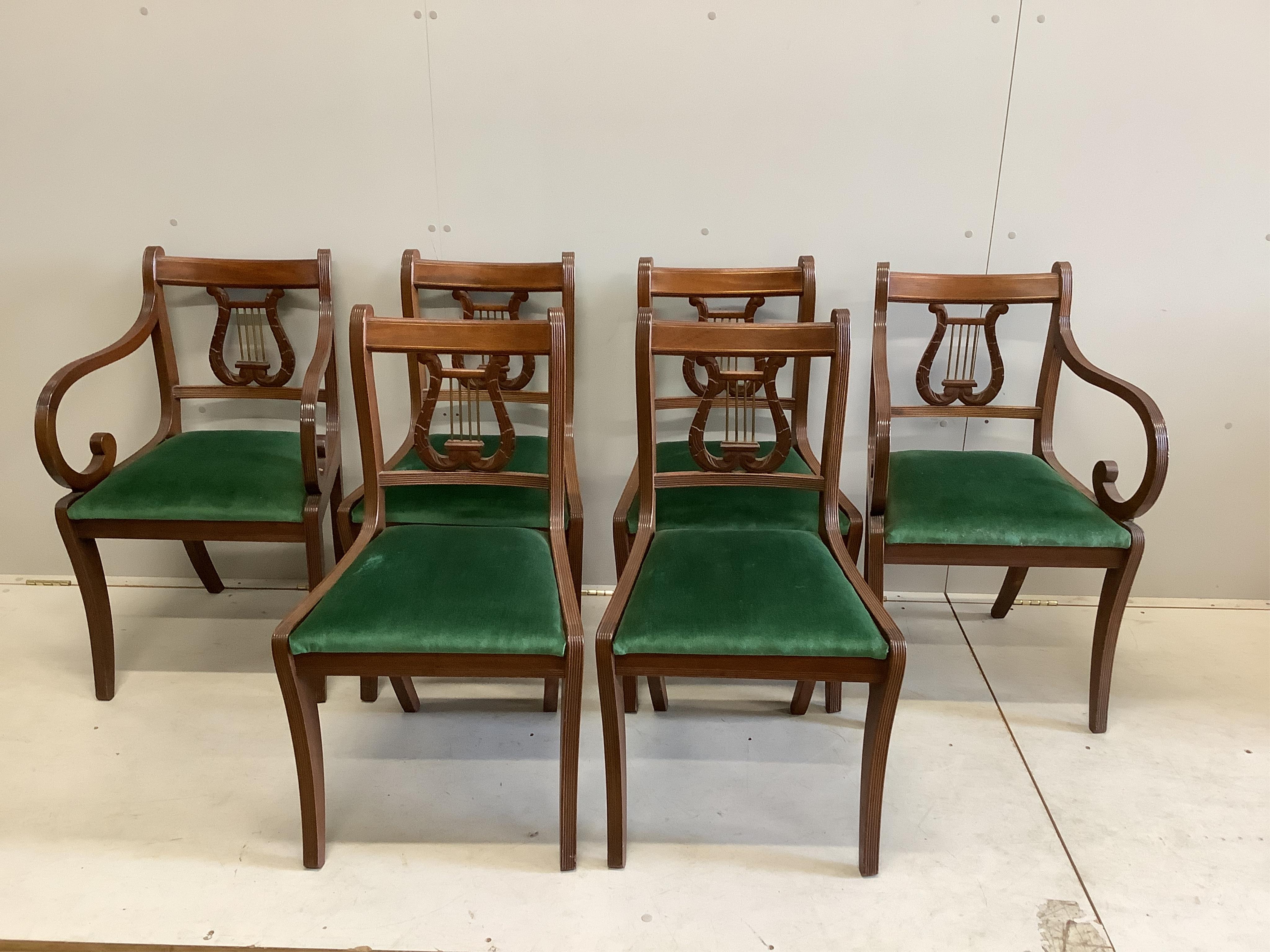 A Victorian mahogany extending dining table, width 238cm extended, two spare leaves, depth 120cm, height 68cm together with a set of six reproduction Regency style dining chairs (two with arms)